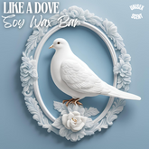 White Dove sat on white blooming flowers in a Cameo style white frame. The background is powder blue, with the name "LIKE A DOVE SOY WAX BAR" is written in white on the top left corner