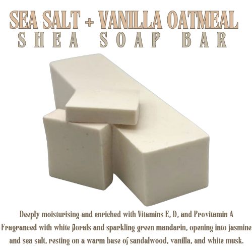 A creamy white loaf of soap, with 2 slices positioned at the front of the image.  The background is white.